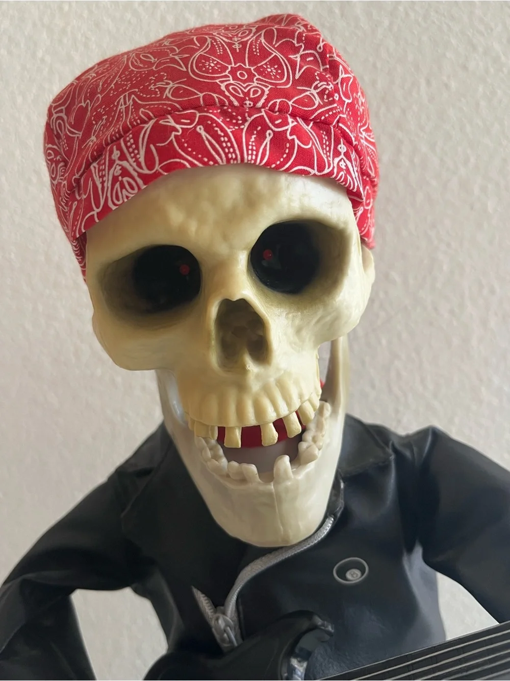 Skeleton Guitarist Décor with Red Bandana and Black Jacket